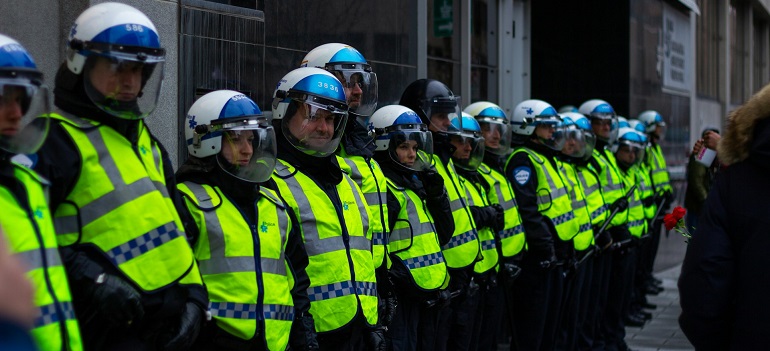 police officers providing essential services in Etobicoke