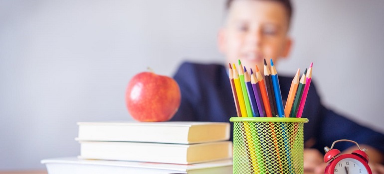 a boy in a classroom 