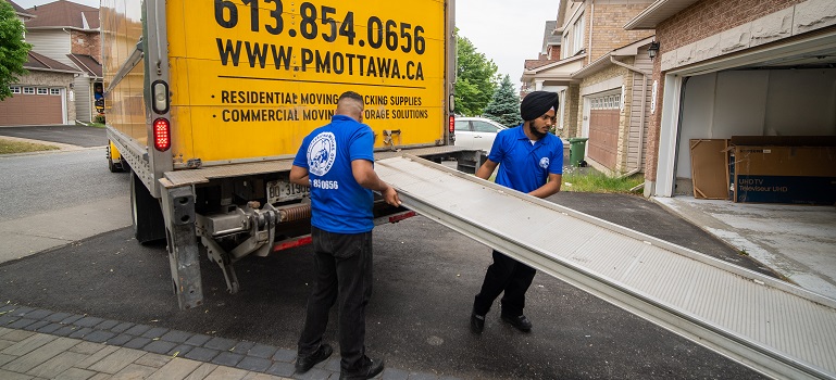 Halton movers loading items into a truck