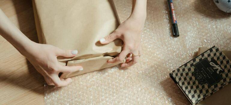 a girl doing everything by our packing guide for a move from East York to Ajax