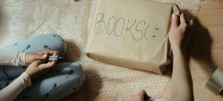 a couple following our packing guide for a move from East York to Ajax
