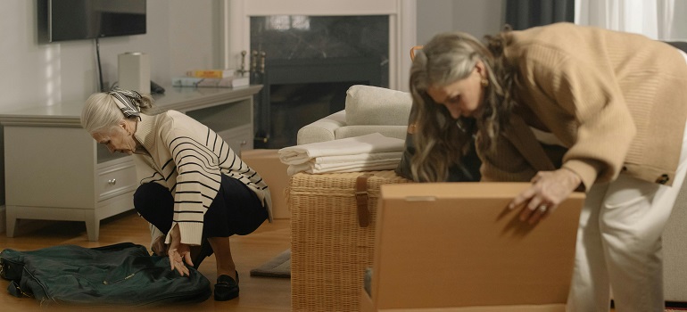 two elderly ladies packing for one of the places in Toronto for retirees