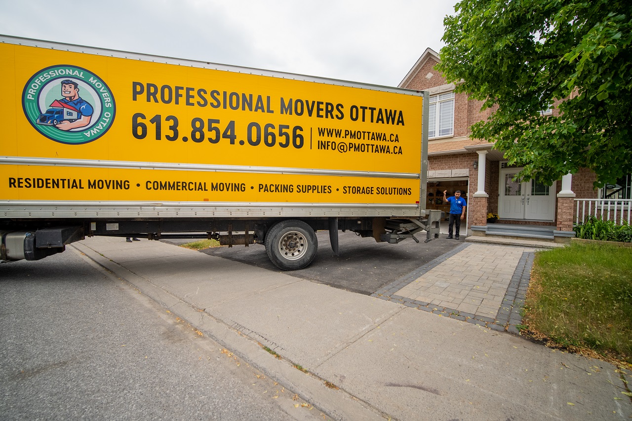 a moving van in a driveway