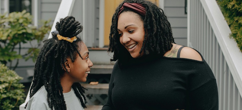 a mother talking to her daughter about moving to one of the Ontario locations for expecting parents