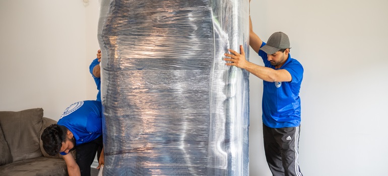 movers packing items for a spring move from Brampton to Oshawa