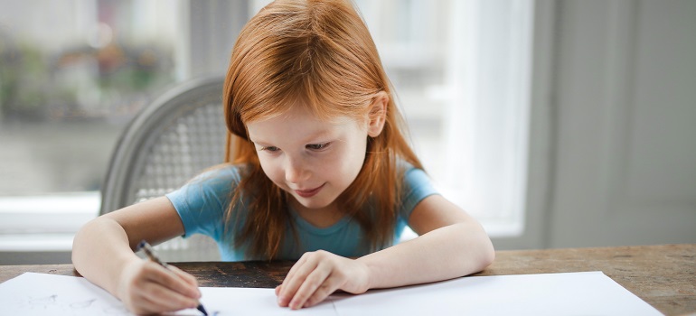 a young girl preparing for school
