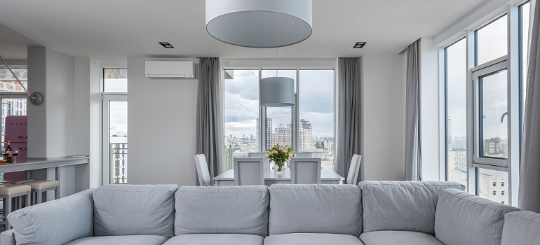 a sofa of a family who is wondering how Toronto’s high-rise living affects furniture moving