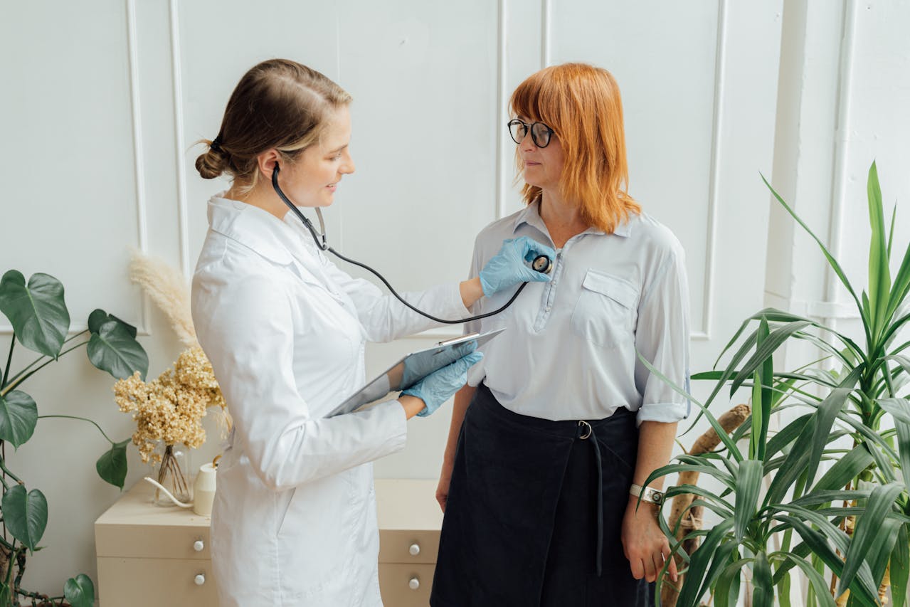 a medical doctor examining her client