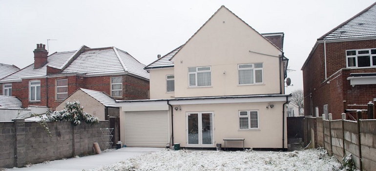 Snow-covered semi-detached house showcasing typical winter in Scarborough.