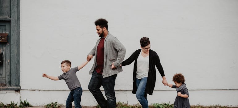 Family enjoying a walk in family-friendly suburban neighborhoods in East York.