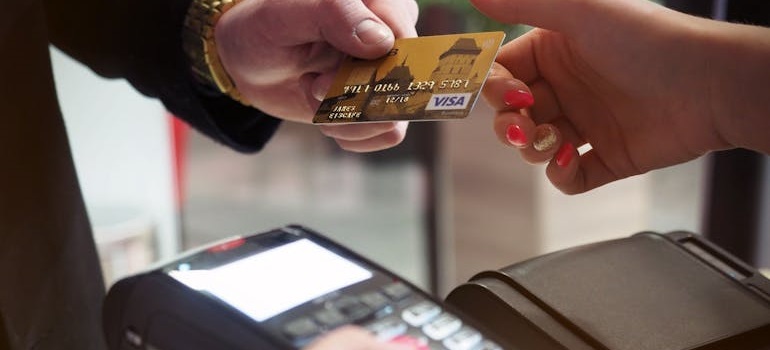 Credit card payment at retail counter.