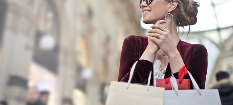 a girl with shopping bags