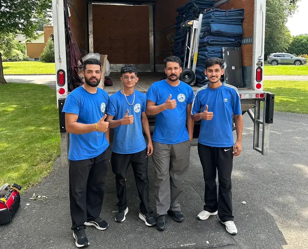 Professional Movers crew unloading furniture during a Hamilton residential move